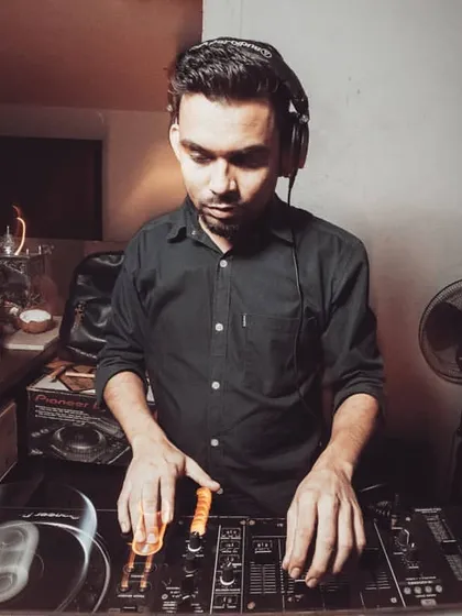 Adjusting the levels to create a balanced and powerful sound. My experience as a club DJ means I know how to work with different sound systems.