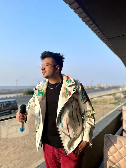 Catching a quiet moment after a high-energy event in Daman. The sea breeze is the perfect way to cool down after setting the stage on fire.