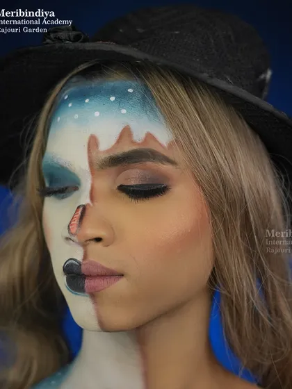 This split-face concept is a great way to showcase technical skill and creativity, a technique often used in makeup competitions and editorials.