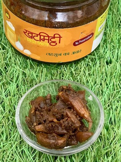 A close-up of my Lahsun ka Achaar. The garlic is pickled until tender and is coated in a thick, flavourful masala.