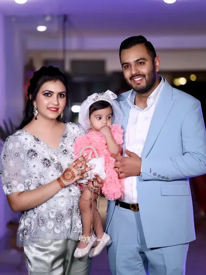 A lovely family portrait with the parents and their little daughter in her pink party dress. I make sure to get classic posed shots that families can frame.