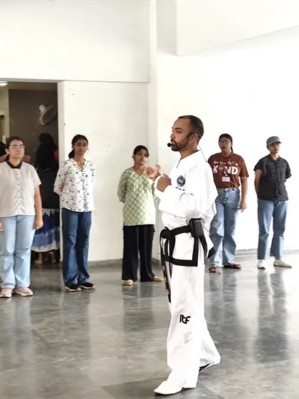 A wide shot of the training space at LSR College, with students attentively observing a demonstration. We ensure our workshops are interactive and engaging for everyone involved.