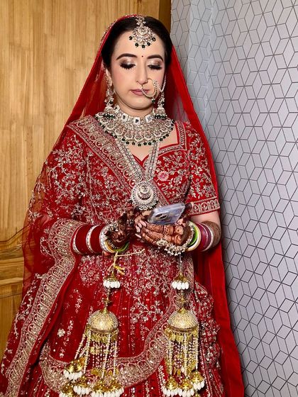 My lovely bride Vismita. I created a glamorous look with glittery eyes and a flawless base that made her shine on her special day.