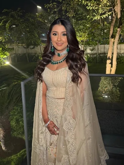 Urvi's smile and glowing makeup light up the night. This is the perfect glam for a memorable evening.