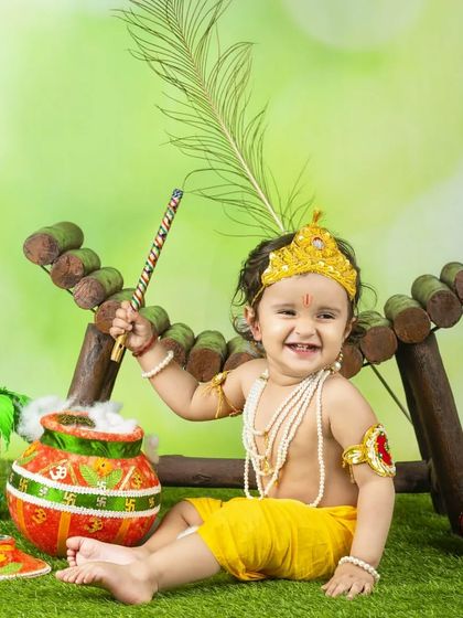 A joyful little Krishna, laughing as he holds his flute. These photos are a wonderful way to celebrate the festival.