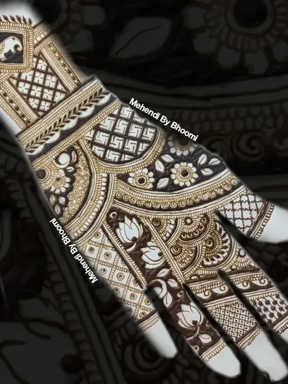 A digitally rendered design showcasing a complex pattern. This piece includes an elephant motif, lotus flowers, and various types of intricate gridwork.