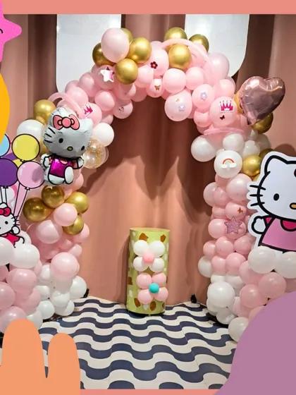 A purr-fectly adorable Hello Kitty themed party! The pink and gold balloon arch and cute character cutouts make for a super sweet celebration.