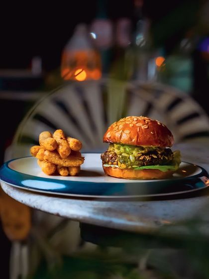 Can a burger be great and vegetarian? Our Luxuriant Quinoa Tofu Burger, with its seed-crusted patty and edamame hummus, answers with a resounding yes.