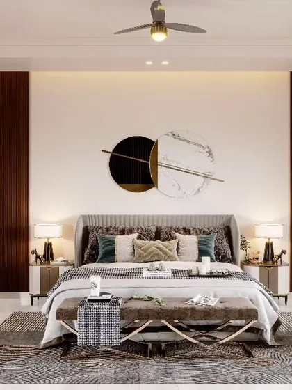 A luxurious bedroom design featuring rich wood paneling flanking a statement wall with modern circular art. The layered rugs and plush upholstery add a sense of comfort and warmth to the contemporary aesthetic.