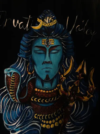 A close-up of the Lord Shiva portrait. This view lets you appreciate the detailed line work in his hair, the texture on the serpent, and the careful shading that gives his face dimension.