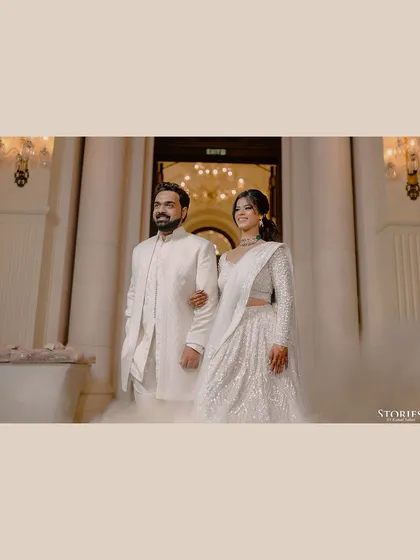 Akanksha and Praneet making their entrance, surrounded by theatrical smoke for a dreamy effect.