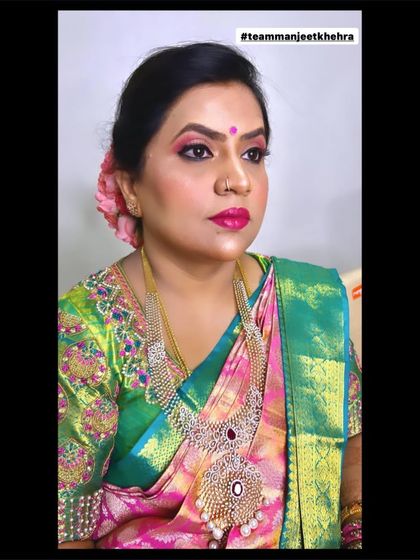 The makeup is designed to be vibrant and long-lasting for an evening of celebration.