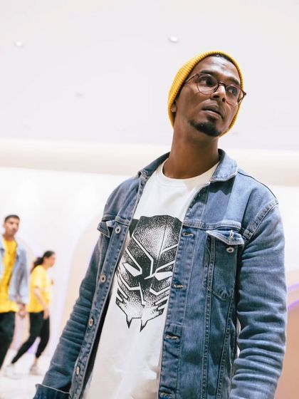 Another shot of me in my element, wearing a Black Panther tee. It's a nod to the heroes and stories that inspire me.