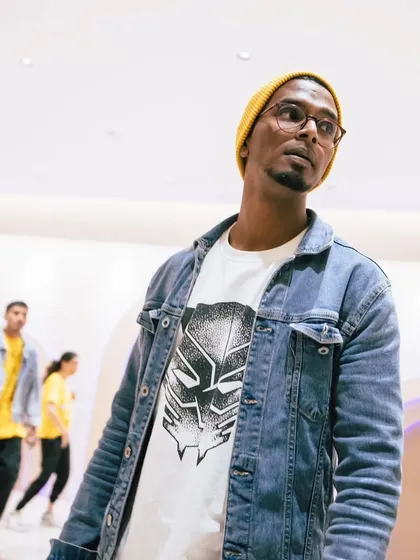 Another shot of me in my element, wearing a Black Panther tee. It's a nod to the heroes and stories that inspire me.