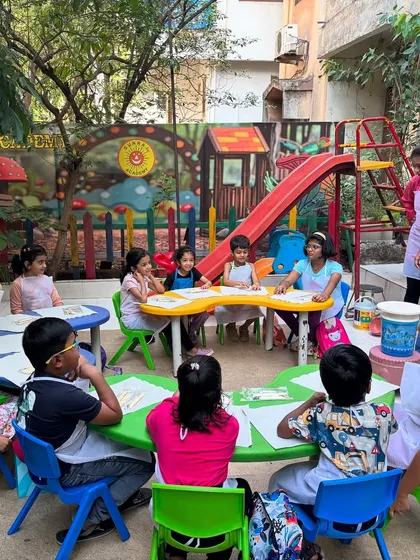 This is what our outdoor workshops look like: a circle of friends, engaged and creating together. I guide the session, but the real magic happens when children collaborate and learn from each other in a safe, playful environment.