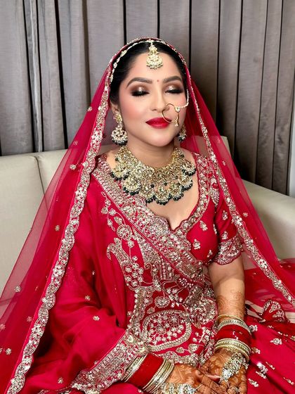 A beautiful candid moment showing the shimmering eyeshadow and perfectly blended base. This look was all about classic glamour.