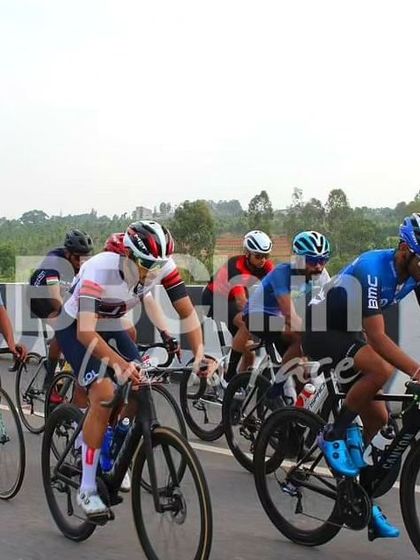 The elite peloton, a sea of focused faces and high-performance bikes.