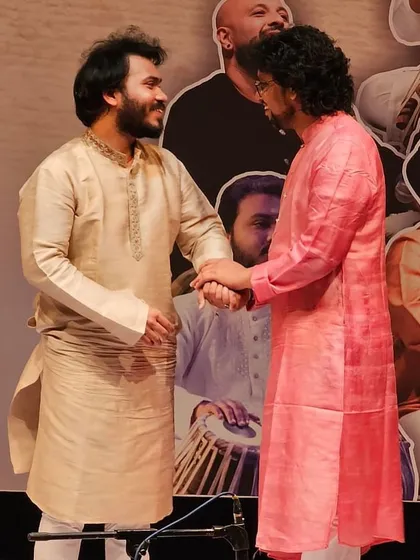 A beautiful moment of camaraderie with my elder brother Shri Milind Vasudev Kulkarni bhaiya after our performance in Pune. The connection between artists on stage is key.