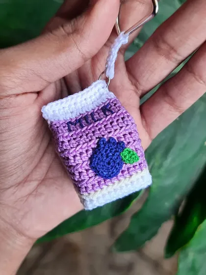 This blueberry milk carton keychain is so vibrant. The purple and blue color combination is just lovely.