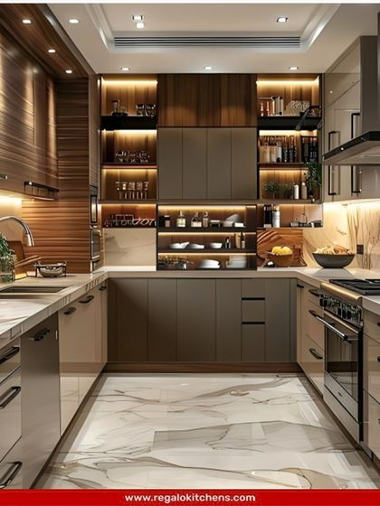 A luxurious U-shaped kitchen featuring high-gloss cabinets and a stunning marble floor and backsplash. The combination of wood and beige tones, along with integrated appliances, creates a high-end, professionally designed look.