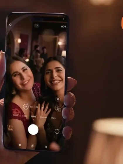 Showcasing the final look on camera for the Xiaomi ad. The makeup appears flawless and natural even on a phone screen, which is key for digital campaigns.