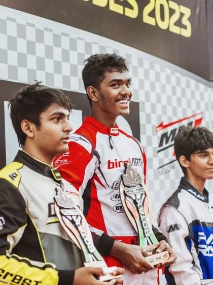 Driver Abhay celebrating a hard-earned podium finish at the Meco FMSCI RMC India 2023. His results include P1 in the finals for both Round 2 and Round 3.