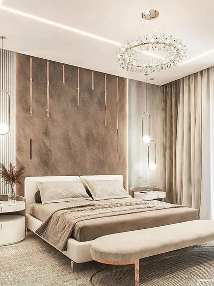 We designed this master bedroom as a serene and luxurious retreat. The space features a sophisticated palette of neutral tones, layered textures, and custom lighting, including a statement crystal chandelier and elegant pendant lights, to create a warm and inviting atmosphere.