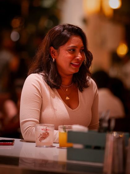 A guest's smile lights up the room during our New Year's Eve party. It's the joy of our guests that brings the magic.