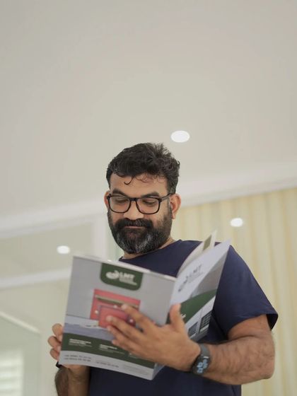 Ebadu Rahman of Tech Travel Eat reviewing our company brochure. He got a hands-on feel for our products and samples.