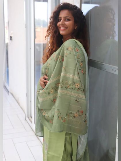 Another beautiful shade of green. This embroidered suit is from a local boutique, showing that great style can be found anywhere. I love helping clients discover hidden gems.