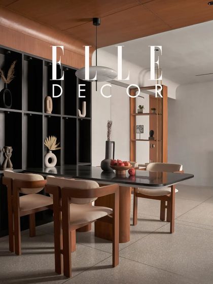 This shot, published in Elle Decor, showcases the dining area's role as a central hub. The design emphasizes natural materials and sustainability, ensuring both beauty and longevity.