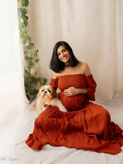 Your fur babies are family too. I always welcome pets into my studio because they are part of your story. Capturing the bond between you and your first baby before the new one arrives is such a sweet and precious memory.
