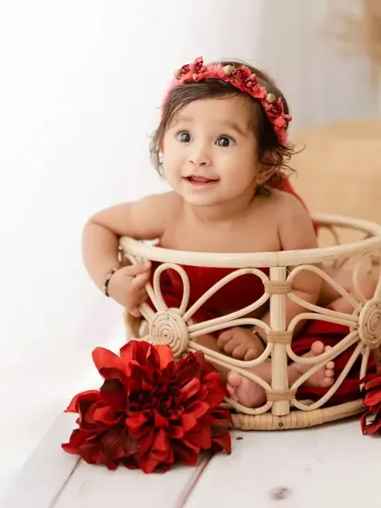 This little girl's expressive face is the highlight of this shot from her 6-month milestone session.