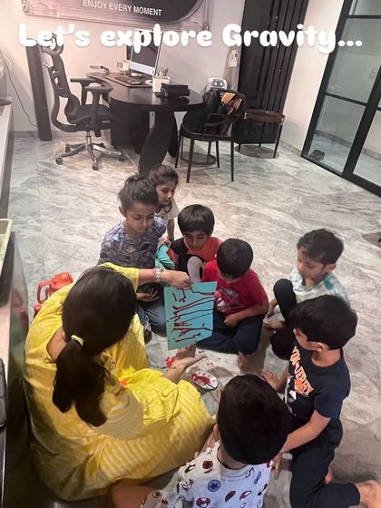 Our exploration of gravity started with a story and some art. This approach helps capture the children's interest before we dive into the more complex scientific experiments.