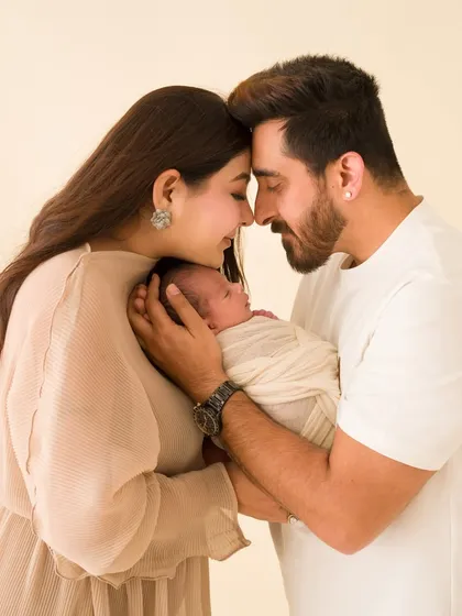 In this quiet moment, a new family is born. I focus on capturing the deep, unspoken love between parents and their newborn. This is a timeless family portrait that they will cherish for a lifetime.