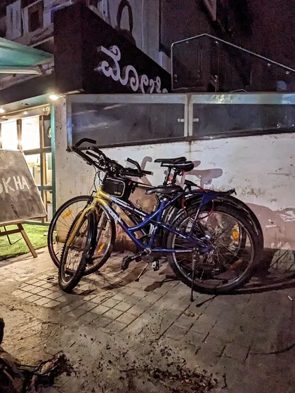 Our cycles taking a break outside a cafe in Indiranagar. This stack represents a pause for lemon tea and good conversation during our Christmas ride.