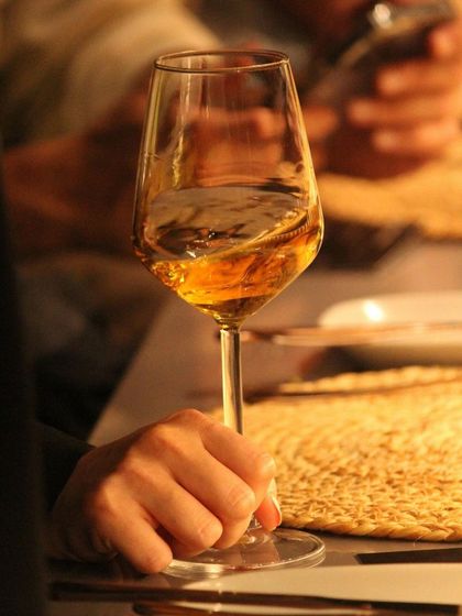 A glass of wine perfectly paired with the Goan-inspired menu of 'The Wonder Years'.