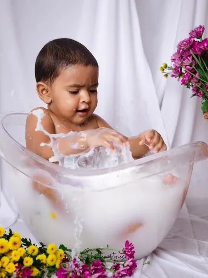 More splashing fun in the milk bath, a perfect way to capture pure joy.