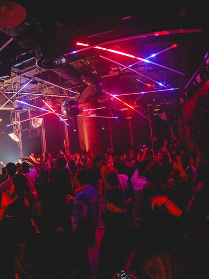 A wide shot of the packed dancefloor at Tuff Club, Singapore. The international love for Afro-Desi music is incredible to witness.