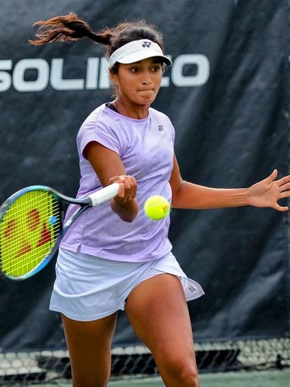 Sahaja's athleticism on full display as she connects with a forehand during the ITF W100 Charleston tournament.