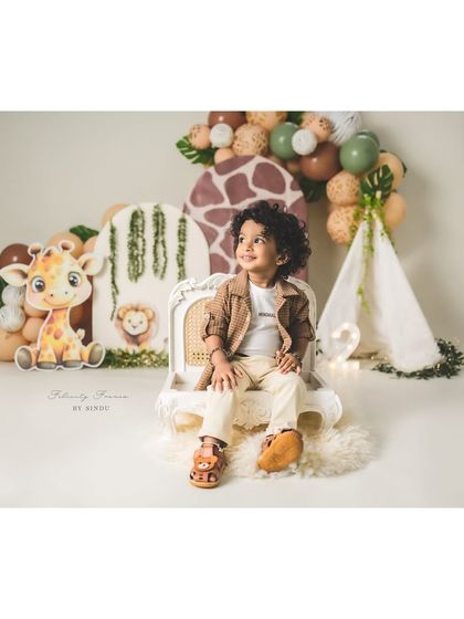A pensive moment for this two-year-old explorer. The safari theme provides a wonderful backdrop for a variety of expressions and poses.