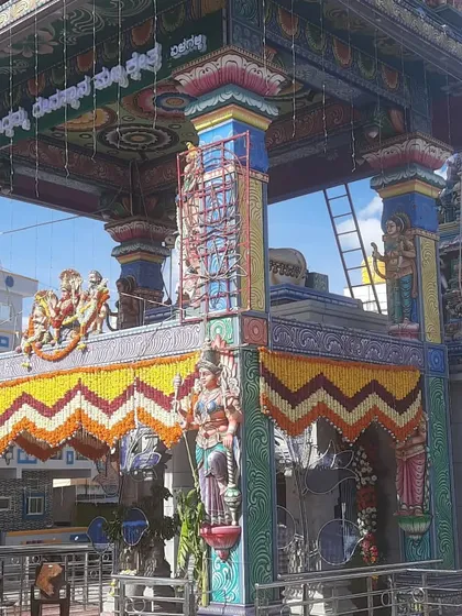 We provide full decoration services for temples and religious buildings. Here you can see our flower arrangements and decorative hangings for a temple festival.