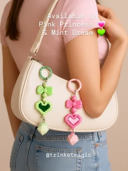 Your bag needs a glow up, and these pixel heart charms are it. This is the ultimate Gen Z vibe, shown here on a classic white shoulder bag. Choose between Pink Princess and Mint Dream to match your aesthetic.