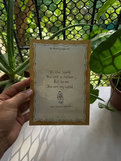 The back of the father and baby illustration, where I added a heartfelt, handwritten quote. This makes the gift even more personal and touching.
