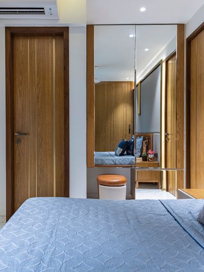 A different perspective of the bedroom in the Filigree House, showing the seamless integration of the dressing area. The design ensures every part of the room is both functional and stylish.
