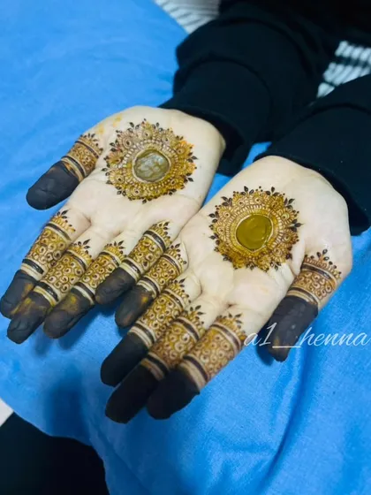 Another angle of the beautiful mandala design, showing the intricate details and the dark, even application of the henna paste.