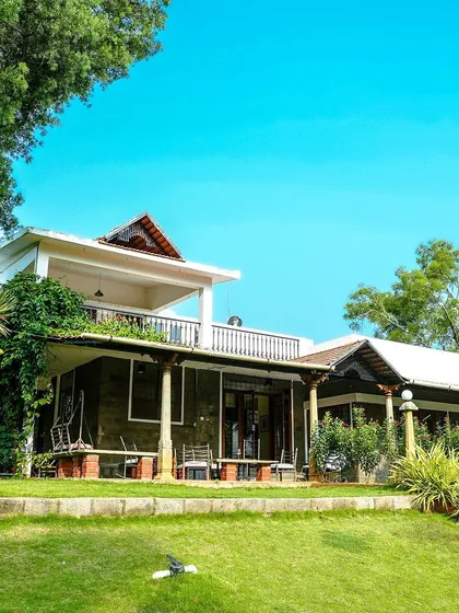 Welcome to our peaceful escape from the city. This is the main villa, surrounded by the green lawns where students can play and relax. I believe that being in a fresh, natural environment is a crucial part of the excursion experience.