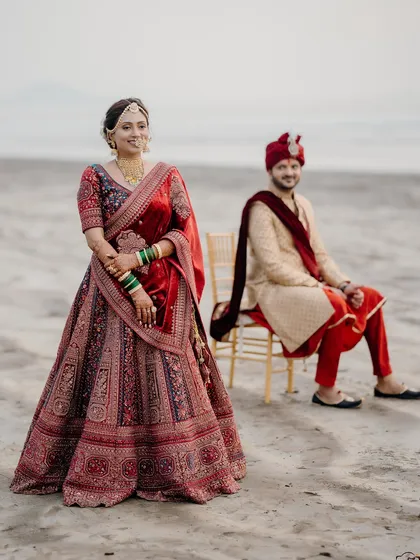A stunning portrait from a destination wedding in Alibaug. We excel at using natural landscapes, like this beach setting, to create breathtaking and memorable wedding photos.