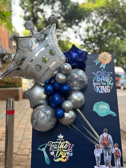 "Dad, you're the king!" This royal-themed postcard says it all with a giant silver crown balloon and a regal blue and silver color palette.