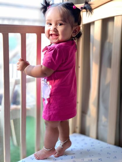 My cupcake turned 8 months old. Capturing these milestones in her little crib has become a tradition.